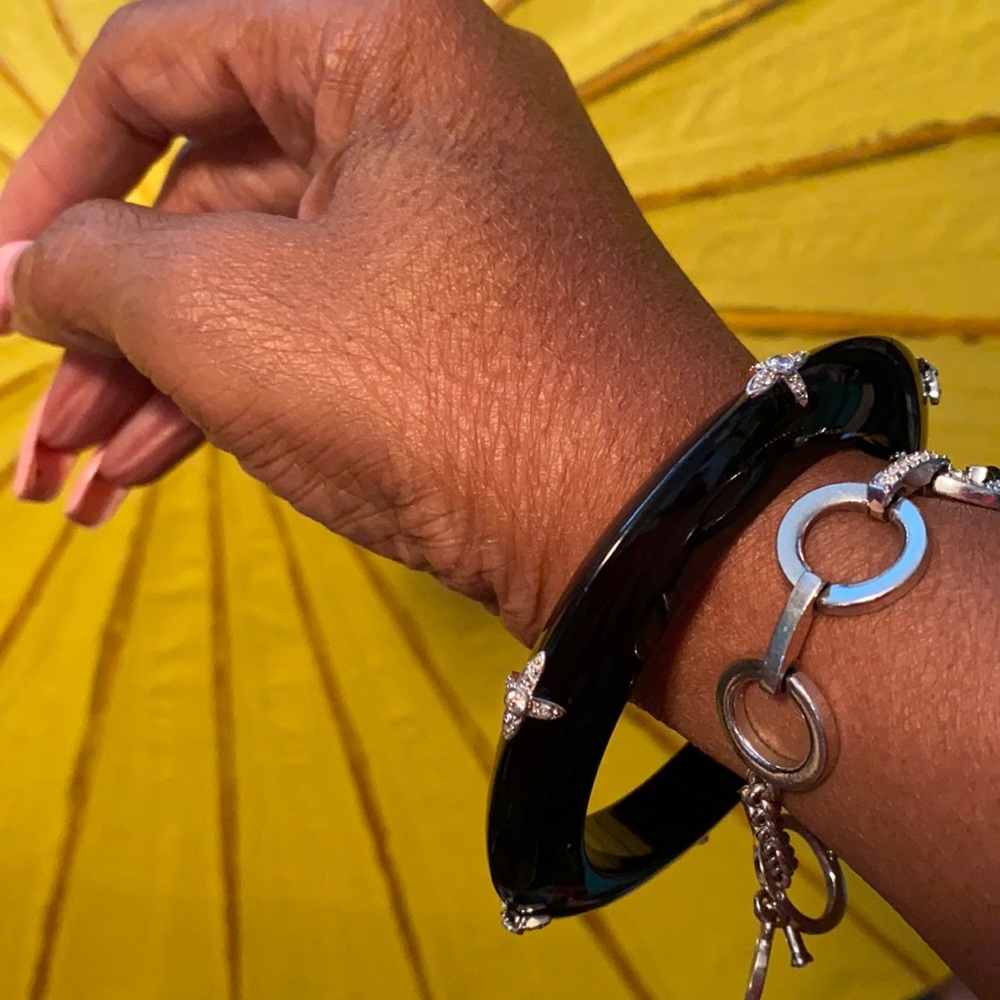 Create strong vibes with a fab, Mariam Salat black bangle!